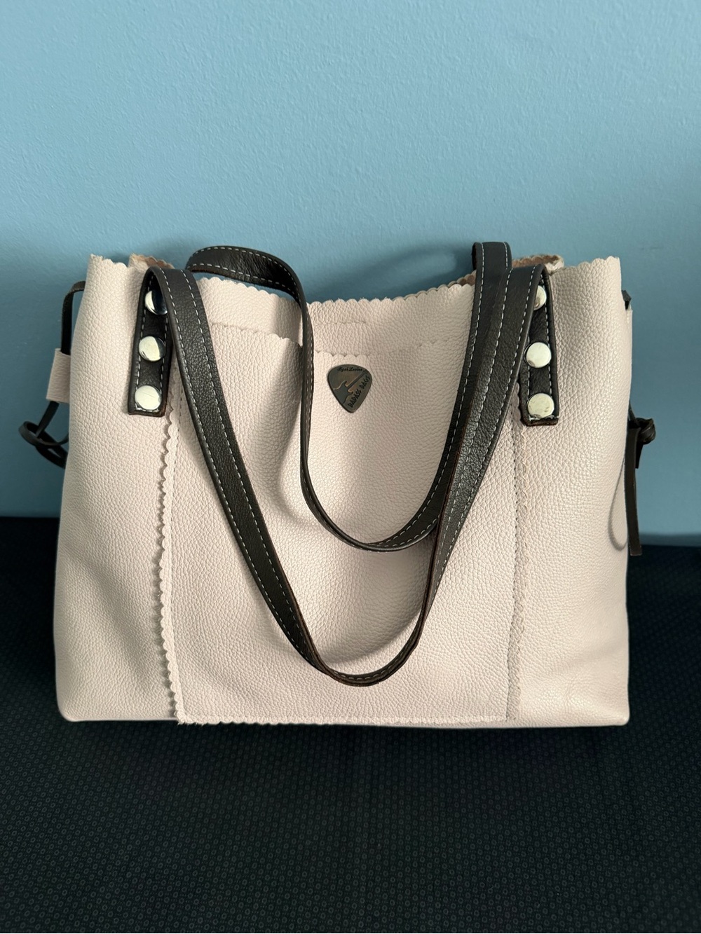 Pale pink leather handcrafted bag by designer Sigal Levine for Badass Bags Co.